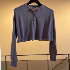 Urban Outfitters Out front under ripped crop top